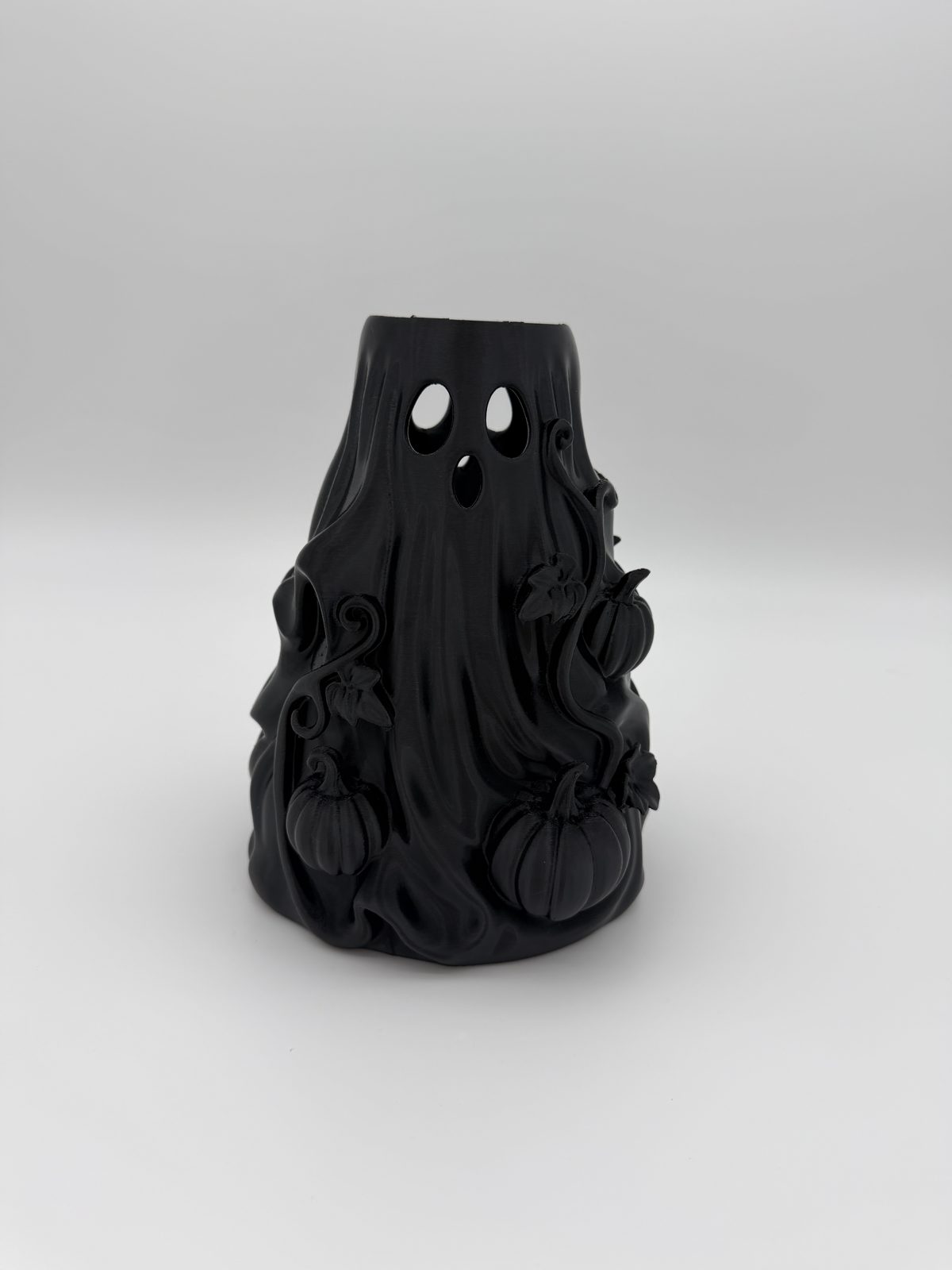 Black 3D printed ghost vase with pumpkin details