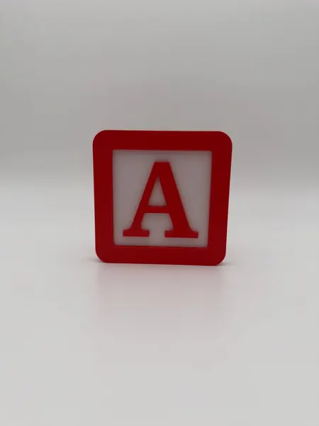 Red and white customizable letter block